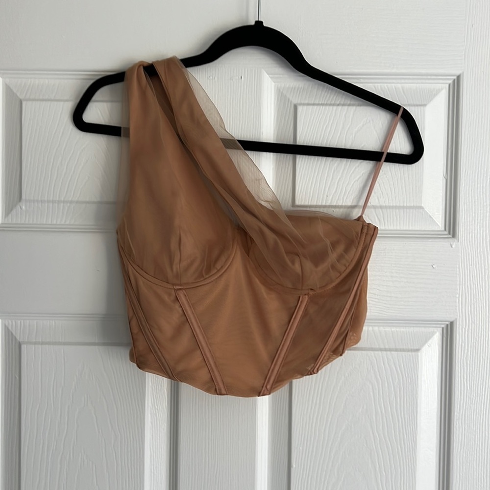 Tan corset crop top with asymmetrical detail